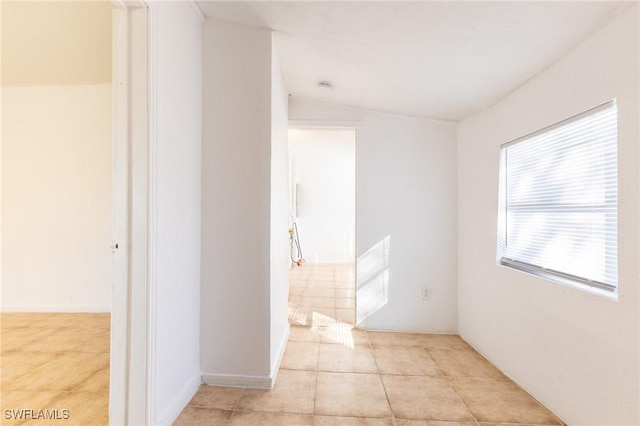 2428 Stella St, Fort Myers, FL 33901 - empty room with vaulted ceiling and light tile patterned floors