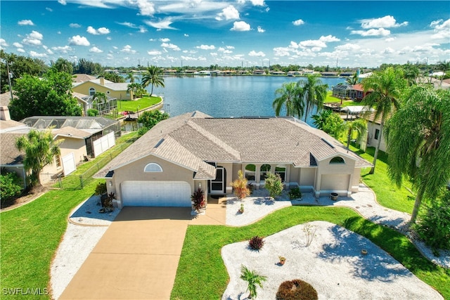 birds eye view of property with a water view