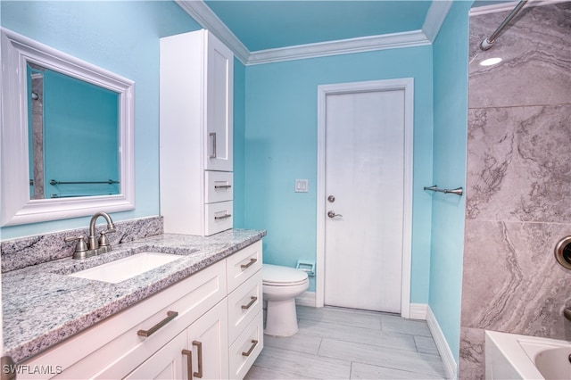 full bathroom featuring tiled shower / bath combo, vanity, toilet, and crown molding