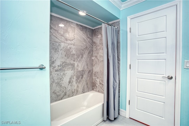 bathroom with ornamental molding and shower / tub combo with curtain