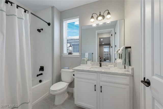 full bathroom with toilet, vanity, tile patterned floors, and shower / bath combo with shower curtain