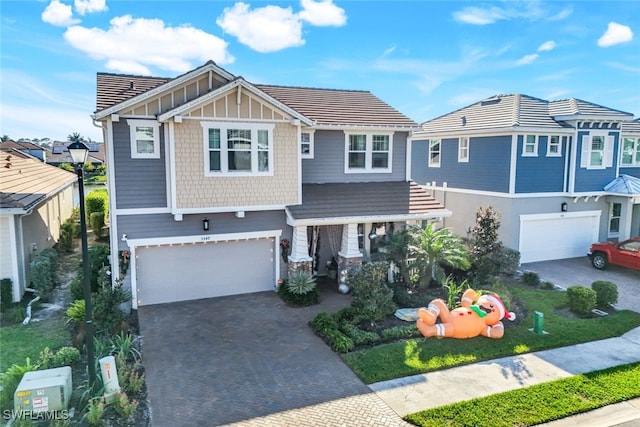 view of front of property featuring a garage