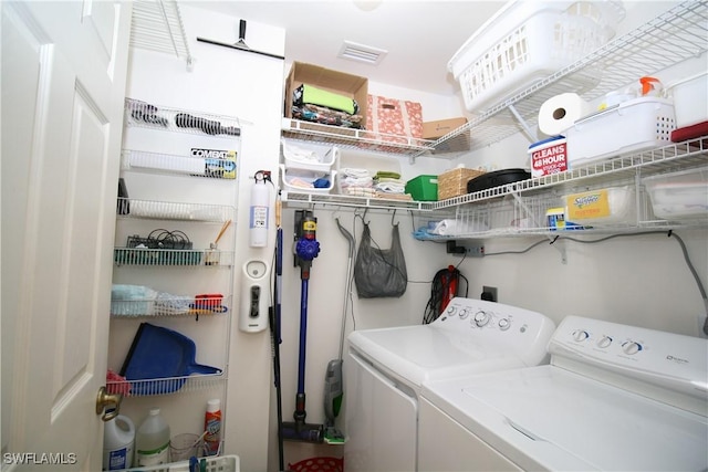 washroom featuring independent washer and dryer