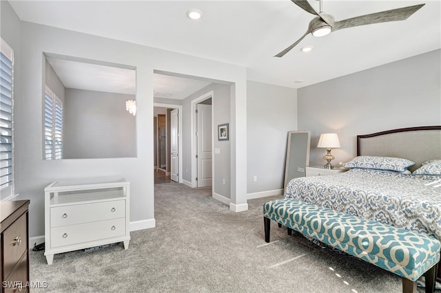 bedroom with light carpet, ceiling fan, baseboards, and recessed lighting