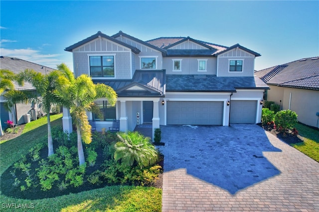 view of front of house with a garage