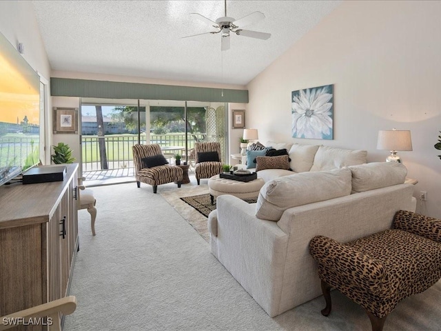 living room featuring light carpet, ceiling fan, high vaulted ceiling, and a textured ceiling