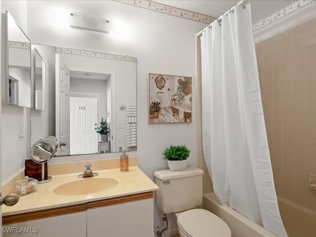 full bathroom with vanity, toilet, and shower / bath combo