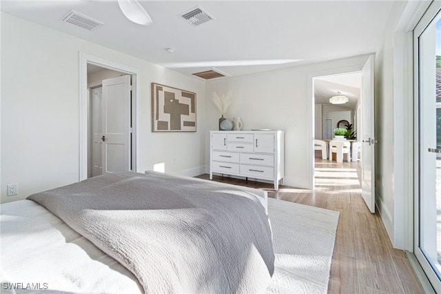 bedroom featuring ceiling fan and light wood-type flooring