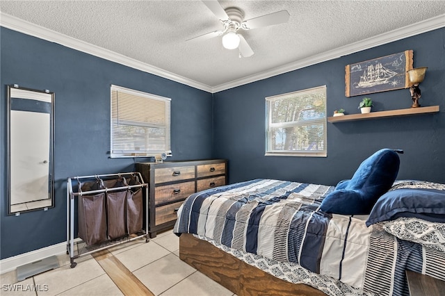 tiled bedroom with ceiling fan, crown molding, and a textured ceiling