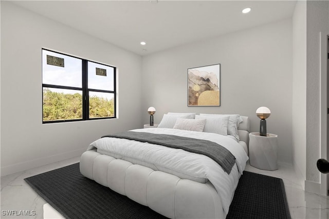 bedroom featuring marble finish floor, baseboards, and recessed lighting