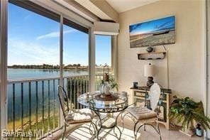 sunroom with a water view