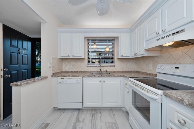 kitchen featuring white cabinetry, white appliances, ceiling fan, and sink