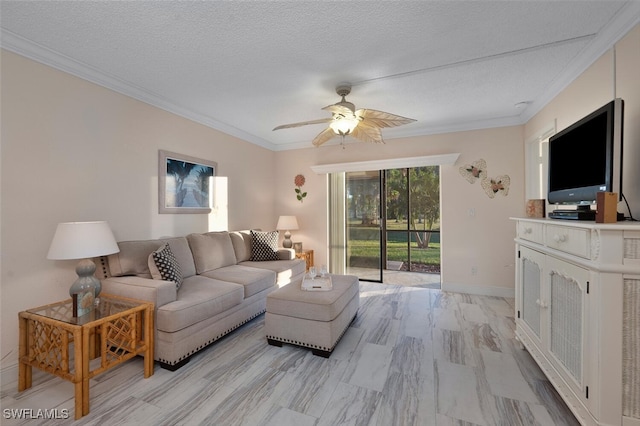 living room featuring crown molding, ceiling fan, and a textured ceiling