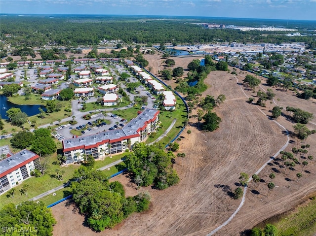 4366 27th Ct SW Unit 1-106, Naples, FL 34116 - aerial overview of property's location featuring a large body of water