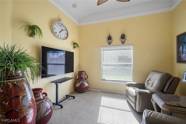 living area featuring crown molding, ceiling fan, and lofted ceiling