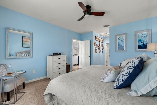 bedroom featuring ceiling fan and light colored carpet