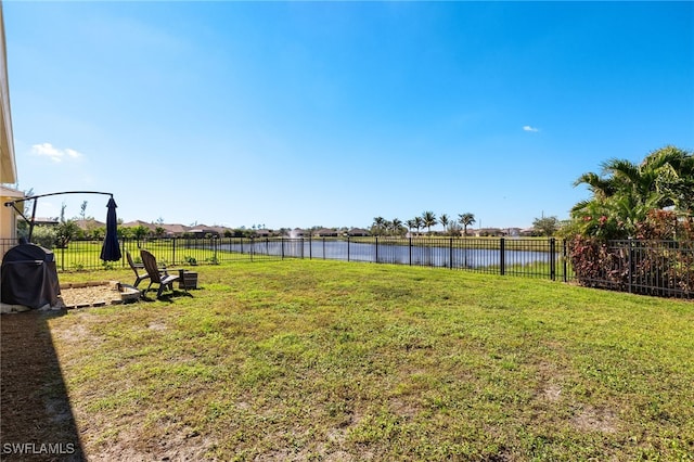 view of yard with a water view