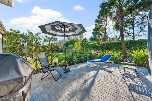 view of patio with a grill