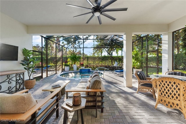 sunroom / solarium featuring a pool and ceiling fan