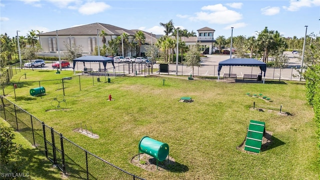 surrounding community featuring a gazebo and a lawn