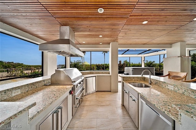 view of patio / terrace with a grill and sink