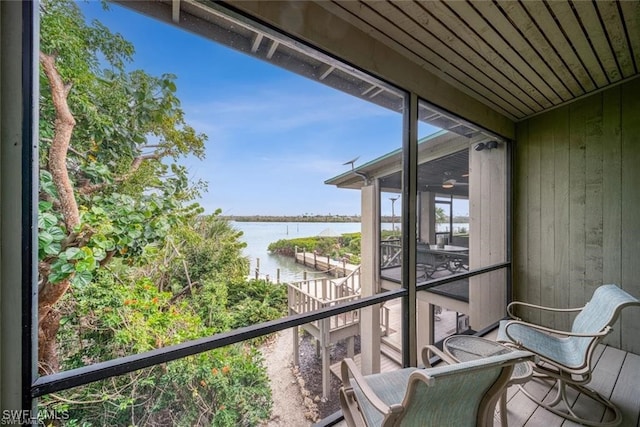 balcony featuring a water view