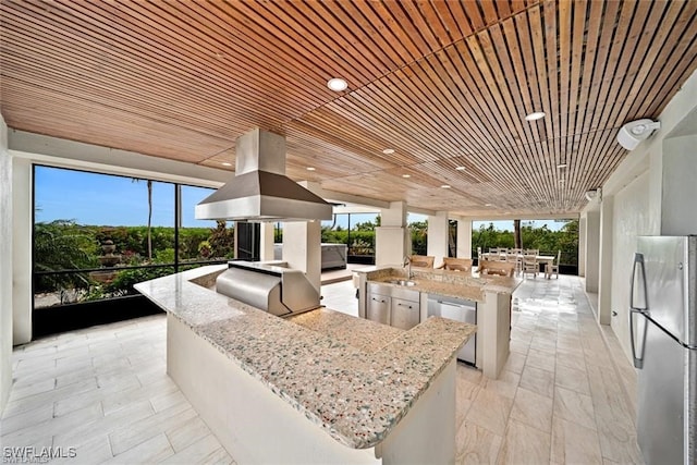 kitchen featuring stainless steel appliances, island exhaust hood, a center island, and wood ceiling