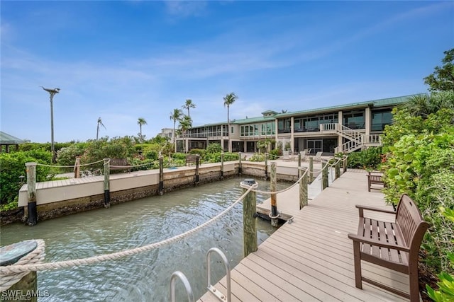 dock area with a water view