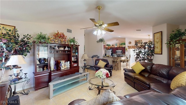 2718 SW 37th St, Cape Coral, FL 33914 - living area featuring tile patterned flooring, vaulted ceiling, and ceiling fan