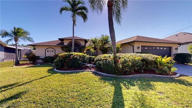 2718 SW 37th St, Cape Coral, FL 33914 - view of front of property featuring stucco siding, a garage, a front lawn, and concrete driveway