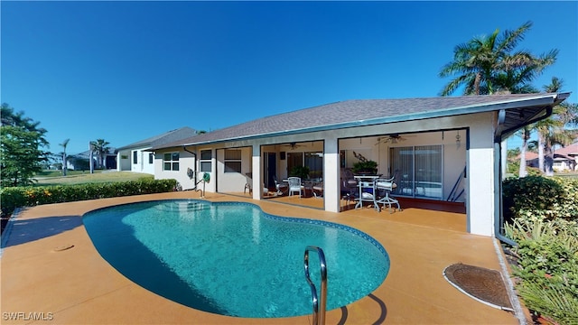 view of pool featuring ceiling fan and a patio area