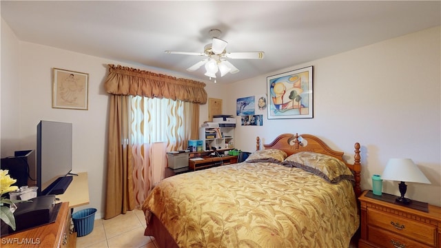 2718 SW 37th St, Cape Coral, FL 33914 - bedroom with light tile patterned floors and a ceiling fan