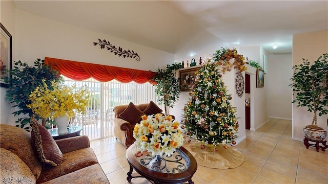 tiled living room featuring lofted ceiling