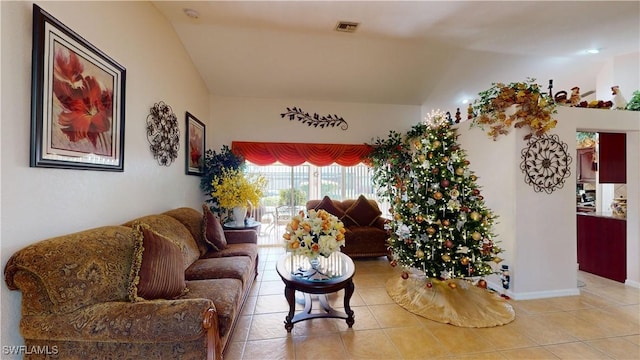 tiled living room with lofted ceiling