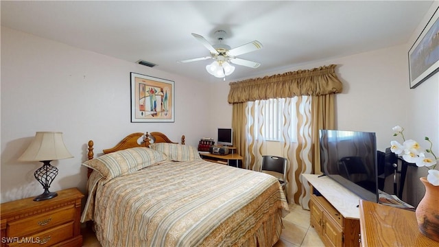 2718 SW 37th St, Cape Coral, FL 33914 - bedroom featuring light tile patterned flooring and a ceiling fan