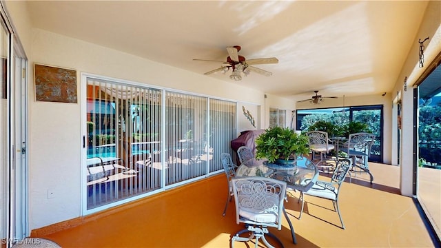 2718 SW 37th St, Cape Coral, FL 33914 - sunroom with ceiling fan and outdoor dining space