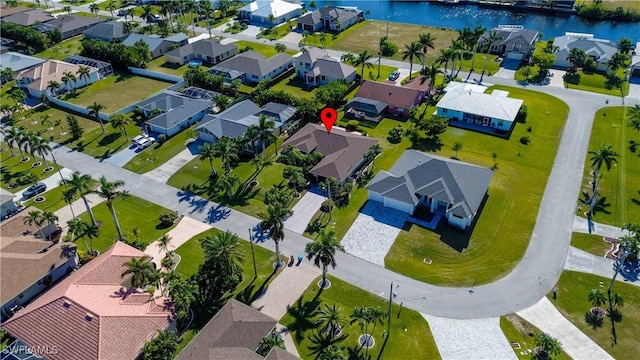 2718 SW 37th St, Cape Coral, FL 33914 - aerial perspective of suburban area featuring a nearby body of water
