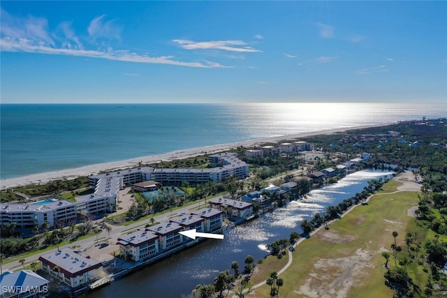 aerial view with a beach view and a water view