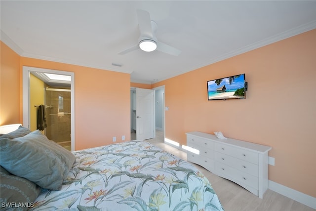 bedroom with ensuite bath, ceiling fan, light wood-type flooring, and ornamental molding