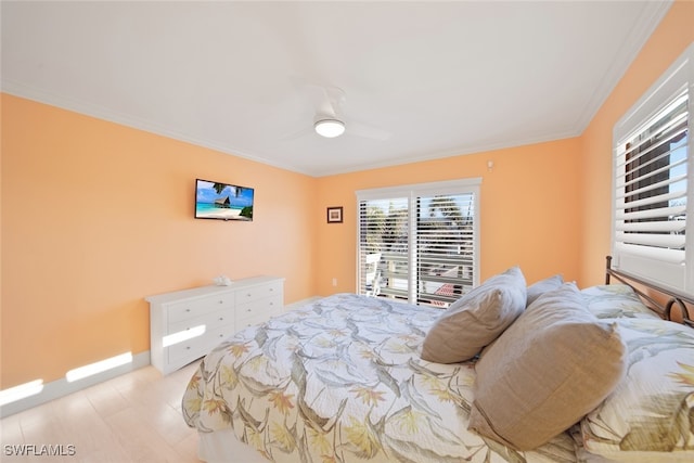 bedroom with access to outside, ceiling fan, and crown molding