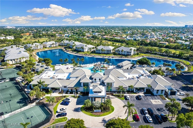 bird's eye view featuring a residential view and a water view