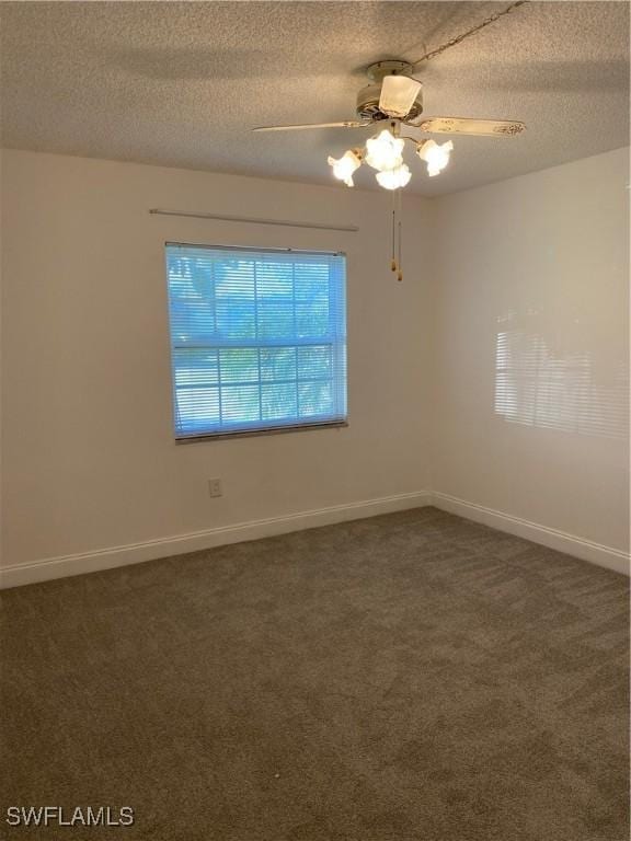 7050 Nantucket Cir Unit 4, North Fort Myers, FL 33917 - unfurnished room featuring a ceiling fan, carpet, a textured ceiling, and baseboards