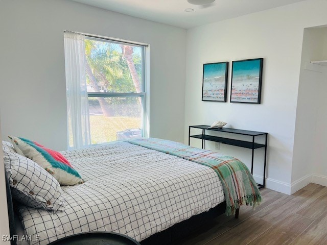 bedroom featuring hardwood / wood-style floors