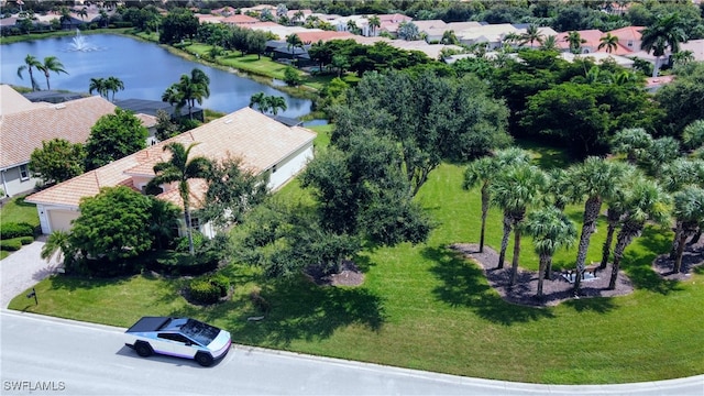 bird's eye view with a water view