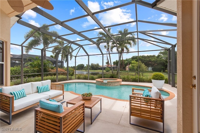 view of pool featuring outdoor lounge area, an in ground hot tub, a patio, and glass enclosure