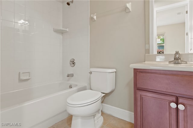 full bathroom with vanity, tiled shower / bath combo, tile patterned floors, and toilet