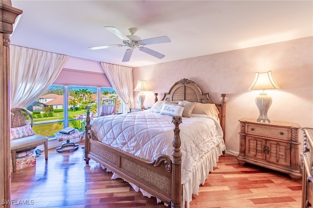 bedroom featuring light wood-type flooring and ceiling fan