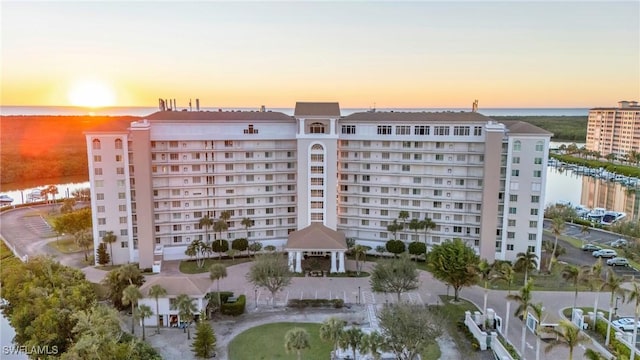 outdoor building at dusk with a water view