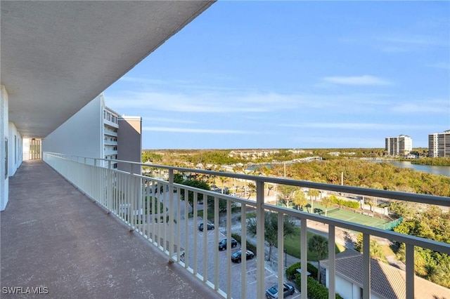 balcony featuring a water view