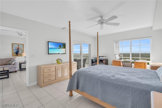 tiled bedroom with ceiling fan